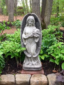 Meanwhile, the garden Angel watches over everything.